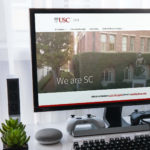 We Are SC web page on desktop monitor